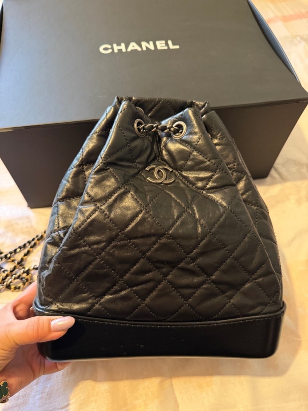 CHANEL Gabrielle Black Quilted Lambskin Drawstring Bucket Bag with Chain Strap
